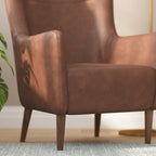 Fauteuil d'appoint capitonné à oreilles avec structure et pieds en bois