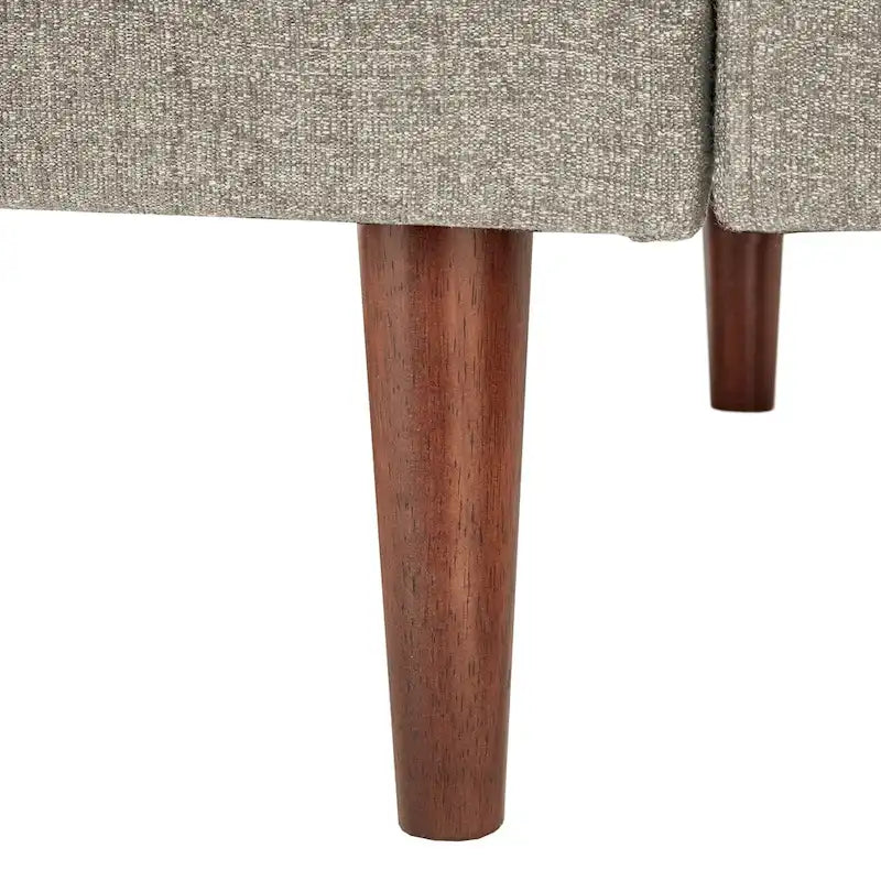 Fauteuil de style Mid-Century avec pieds fuselés et traversins