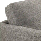 Fauteuil de style Mid-Century avec pieds fuselés et traversins